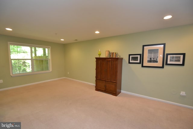 724 Hidden Oak Ln, Glen Burnie, MD 21060 - spare room featuring baseboards, recessed lighting, and light colored carpet