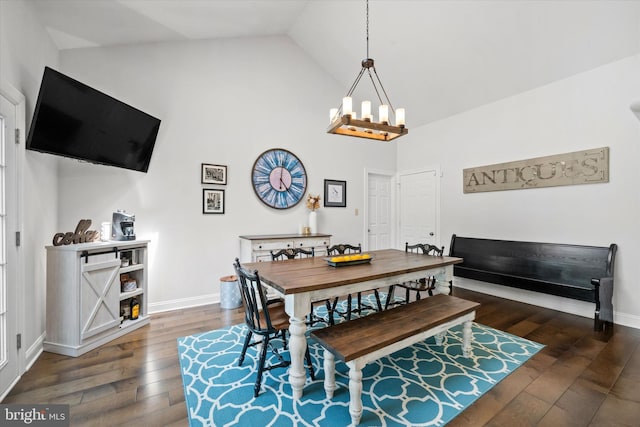 dining area featuring high vaulted ceiling, a chandelier, baseboards, and hardwood / wood-style floors
