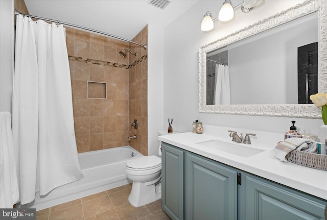 bathroom with tile patterned flooring, vanity, toilet, shower / tub combo, and visible vents