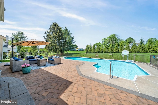 view of swimming pool featuring fence, a fenced in pool, an outdoor living space, and a patio