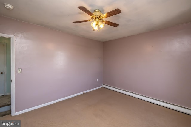carpeted spare room featuring baseboards, ceiling fan, and baseboard heating