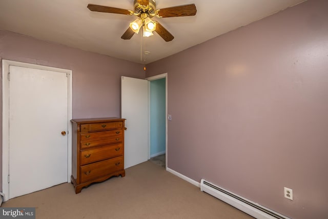 bedroom with light colored carpet, a baseboard radiator, and a ceiling fan