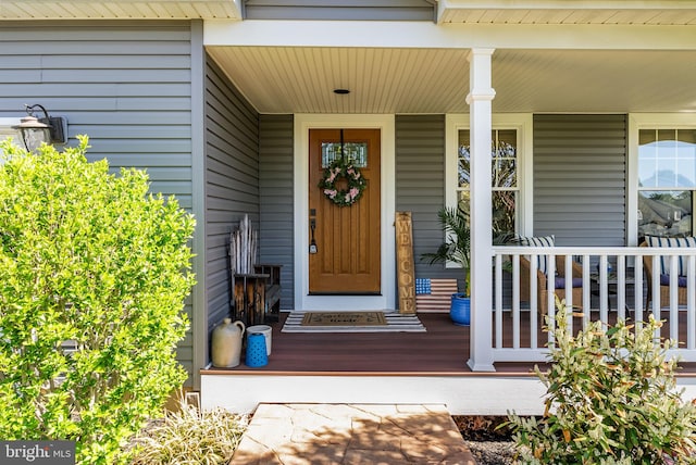 entrance to property with covered porch