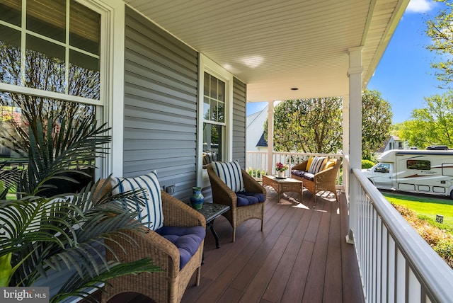 wooden deck featuring a porch