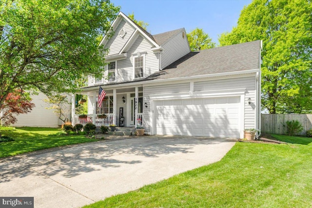 traditional-style home with a garage, fence, a front yard, a porch, and driveway