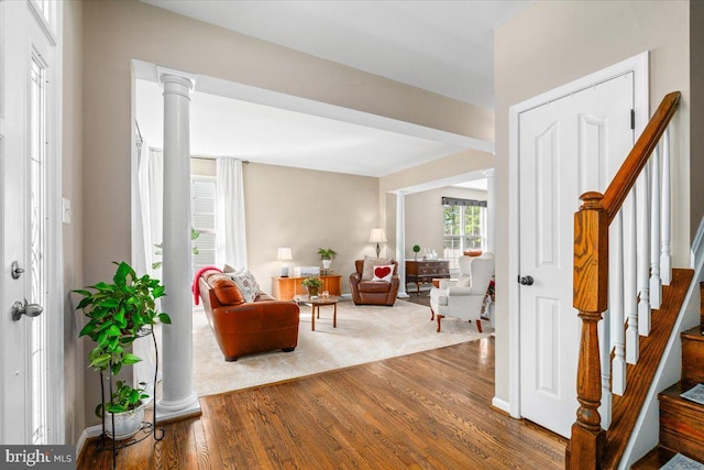 entryway featuring wood finished floors and stairway