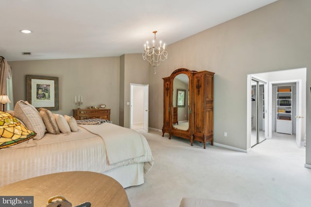 bedroom featuring visible vents, an inviting chandelier, baseboards, a walk in closet, and light colored carpet