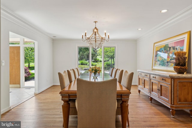 dining area with crown molding, baseboards, recessed lighting, light wood finished floors, and a notable chandelier