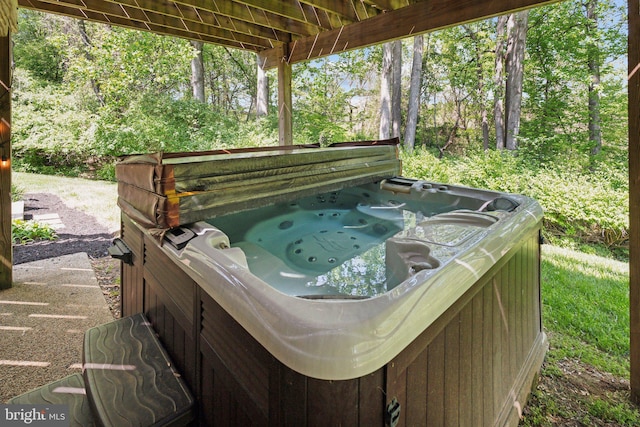 exterior details featuring a jacuzzi