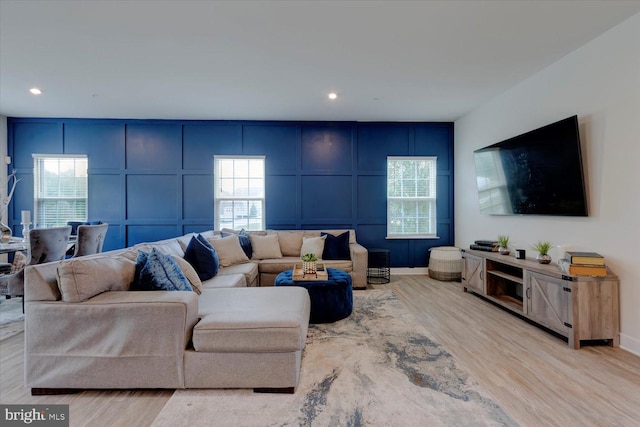 5735 River Shark Ln, Waldorf, MD 20602 - living area featuring a decorative wall, wood finished floors, plenty of natural light, recessed lighting, and baseboards