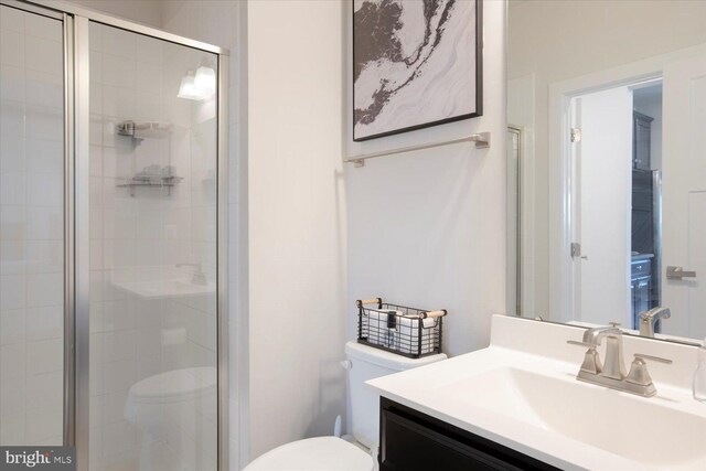 5735 River Shark Ln, Waldorf, MD 20602 - full bath with toilet, a shower stall, and vanity