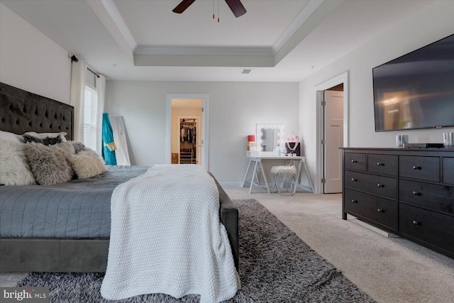 5735 River Shark Ln, Waldorf, MD 20602 - bedroom featuring light colored carpet, a raised ceiling, a ceiling fan, and ornamental molding