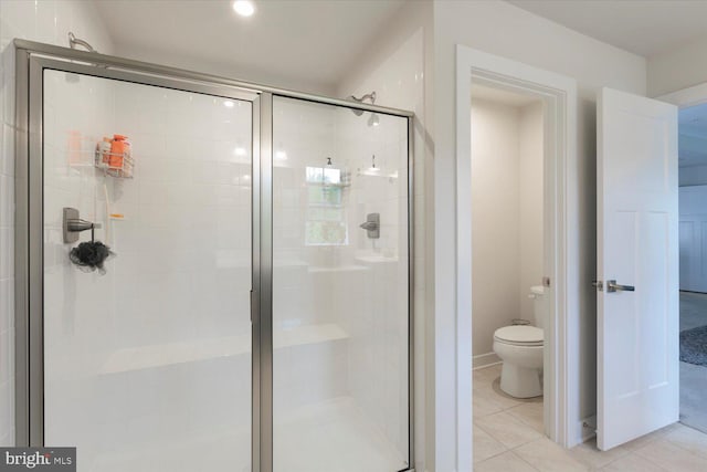 5735 River Shark Ln, Waldorf, MD 20602 - full bath with toilet, a stall shower, and tile patterned flooring