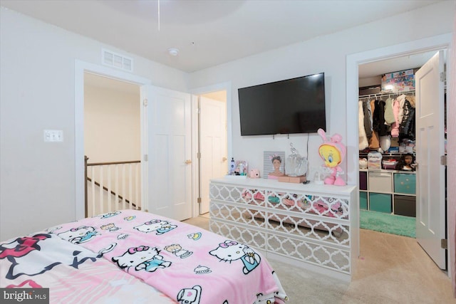 5735 River Shark Ln, Waldorf, MD 20602 - bedroom featuring light colored carpet, a closet, and a spacious closet