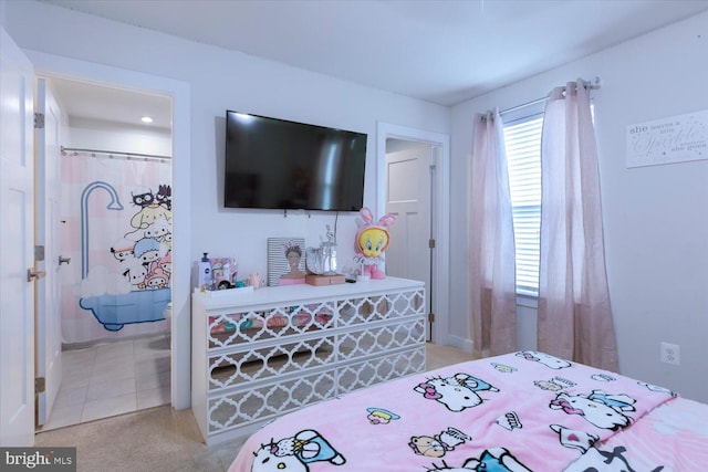 5735 River Shark Ln, Waldorf, MD 20602 - bedroom featuring light colored carpet, baseboards, and ensuite bathroom