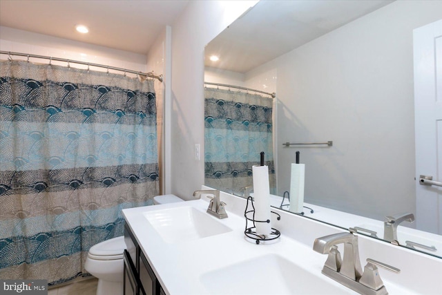 5735 River Shark Ln, Waldorf, MD 20602 - full bath featuring toilet, double vanity, recessed lighting, and a shower with shower curtain