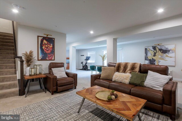 5735 River Shark Ln, Waldorf, MD 20602 - living area with light colored carpet, stairs, recessed lighting, and baseboards