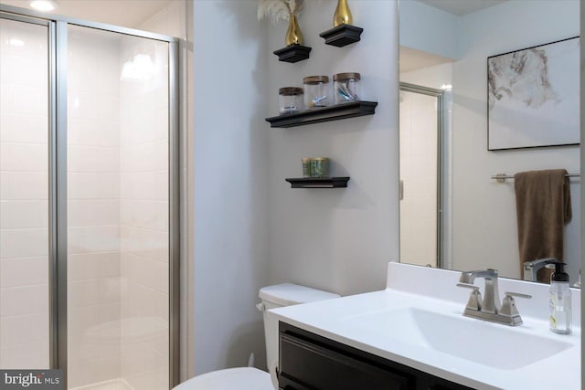 5735 River Shark Ln, Waldorf, MD 20602 - bathroom with toilet, a shower stall, and vanity