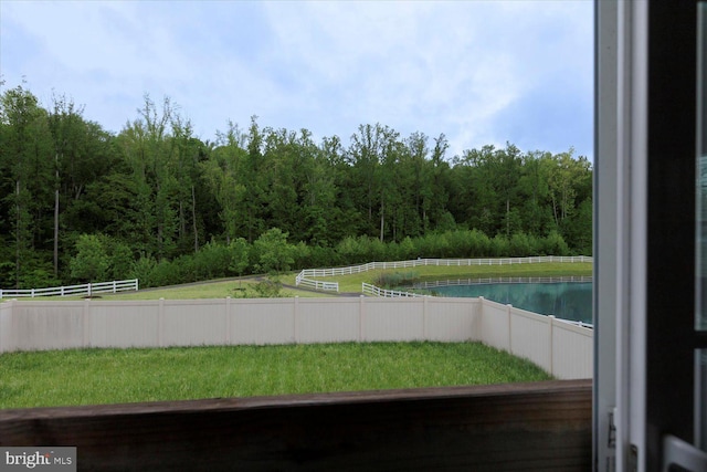 5735 River Shark Ln, Waldorf, MD 20602 - view of yard featuring fence and a view of trees