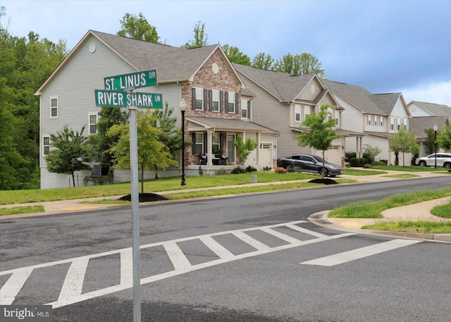 5735 River Shark Ln, Waldorf, MD 20602 - view of asphalt road with sidewalks, curbs, and a residential view