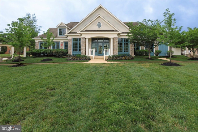 5735 River Shark Ln, Waldorf, MD 20602 - view of front of home featuring french doors and a front lawn