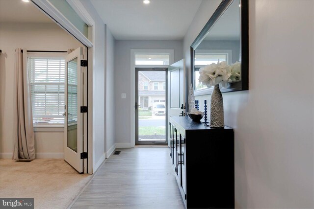 5735 River Shark Ln, Waldorf, MD 20602 - corridor with baseboards and light wood-style floors