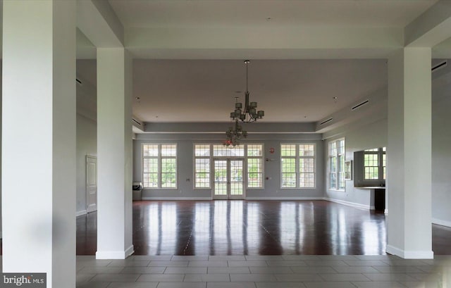 5735 River Shark Ln, Waldorf, MD 20602 - tiled empty room featuring a chandelier and baseboards