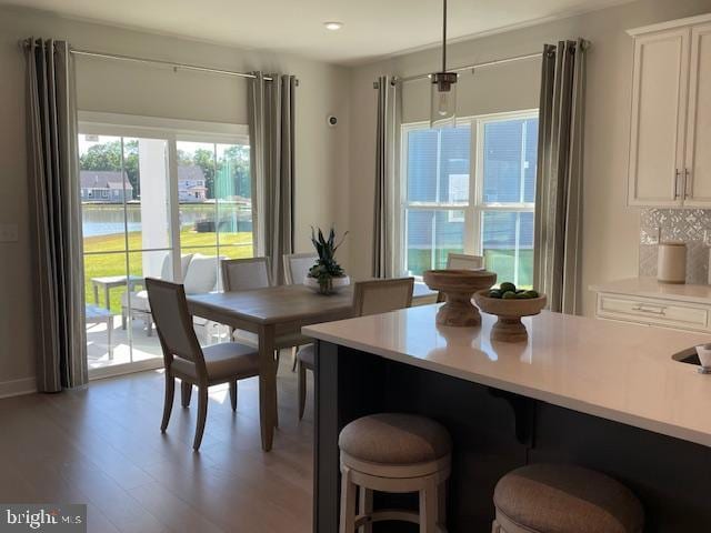 dining room featuring recessed lighting and light wood finished floors