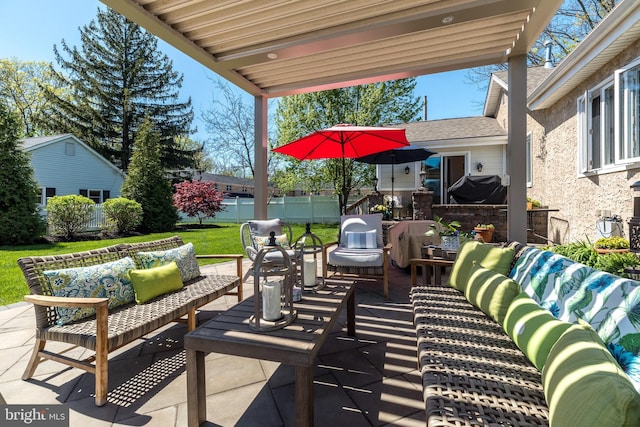 view of patio featuring fence and an outdoor living space