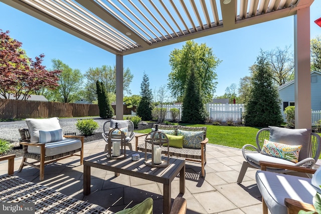 view of patio / terrace featuring a fenced backyard and an outdoor living space