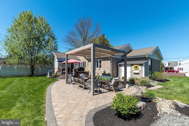 rear view of property featuring fence, an outdoor living space, a yard, and a patio area