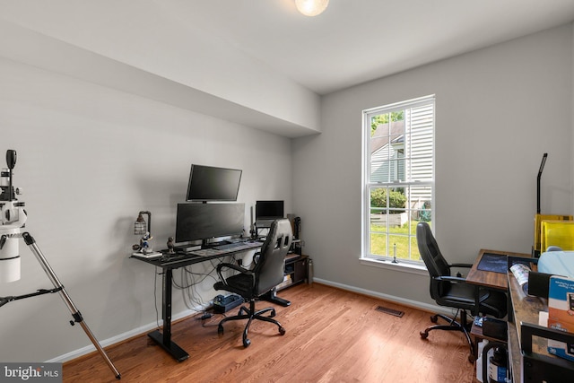 6028 Toomey Ln, Elkridge, MD 21075 - office with baseboards, a wealth of natural light, wood finished floors, and visible vents