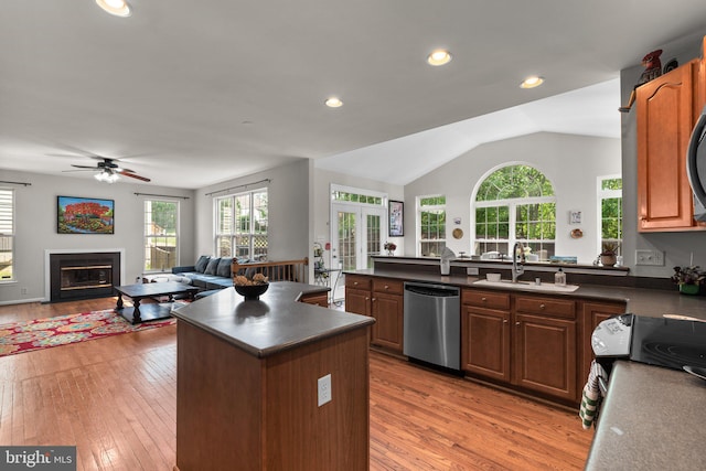 6028 Toomey Ln, Elkridge, MD 21075 - kitchen with ceiling fan, appliances with stainless steel finishes, dark countertops, light wood-type flooring, and a sink