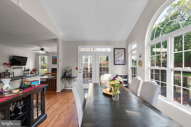 6028 Toomey Ln, Elkridge, MD 21075 - dining area with ceiling fan, french doors, vaulted ceiling, and light wood-style flooring