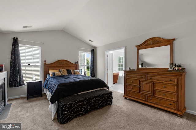 6028 Toomey Ln, Elkridge, MD 21075 - carpeted bedroom with baseboards, vaulted ceiling, ensuite bath, and visible vents