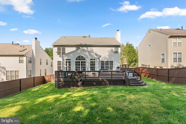 6028 Toomey Ln, Elkridge, MD 21075 - rear view of house featuring a lawn, a fenced backyard, and a wooden deck
