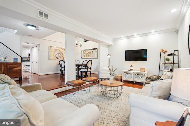 15109 Watergate Rd, Silver Spring, MD 20905 - living area with wood finished floors, crown molding, baseboards, recessed lighting, and a chandelier