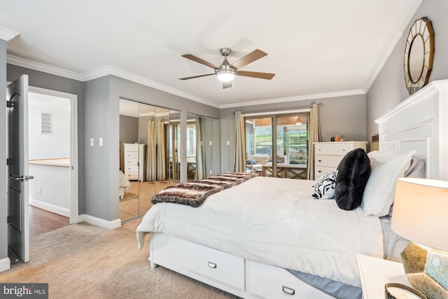 15109 Watergate Rd, Silver Spring, MD 20905 - bedroom with access to exterior, light colored carpet, baseboards, crown molding, and multiple closets