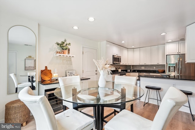 15109 Watergate Rd, Silver Spring, MD 20905 - dining space with light wood-style flooring and recessed lighting