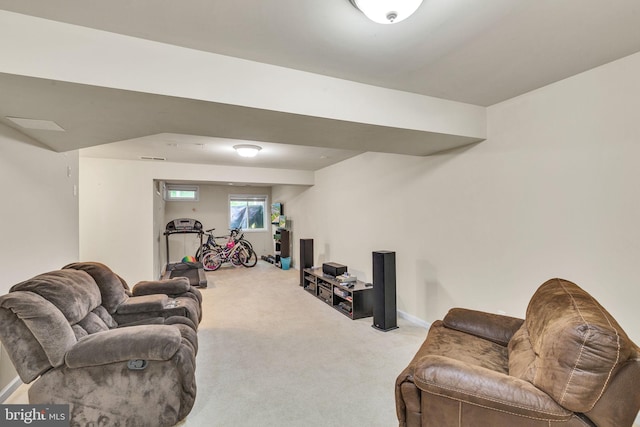 living area with carpet floors and baseboards