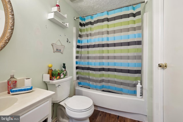 1660 Thenia Pl, Woodbridge, VA 22192 - bathroom featuring vanity, wood finished floors, toilet, a textured ceiling, and shower / bath combo
