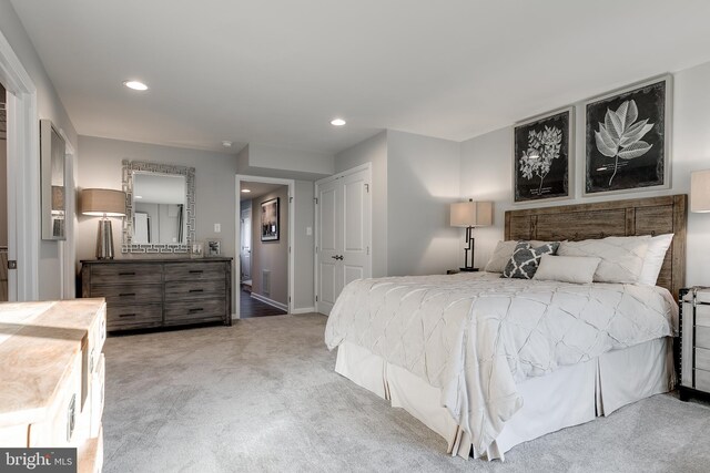 bedroom featuring baseboards, recessed lighting, and carpet