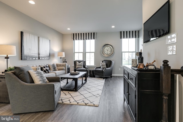 living room with wood finished floors, plenty of natural light, and recessed lighting