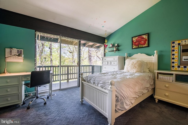 carpeted bedroom featuring access to outside, vaulted ceiling, and multiple windows