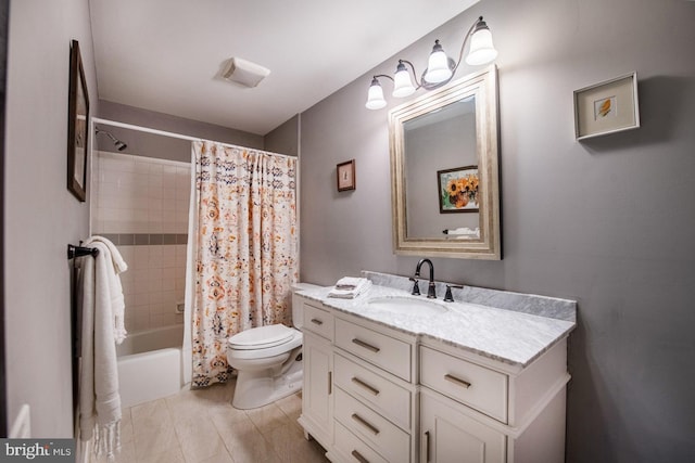 full bathroom with vanity, shower / bath combination with curtain, and toilet