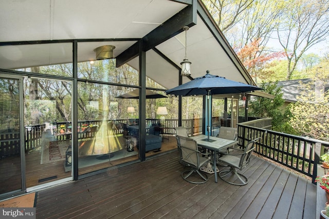 deck with outdoor dining space