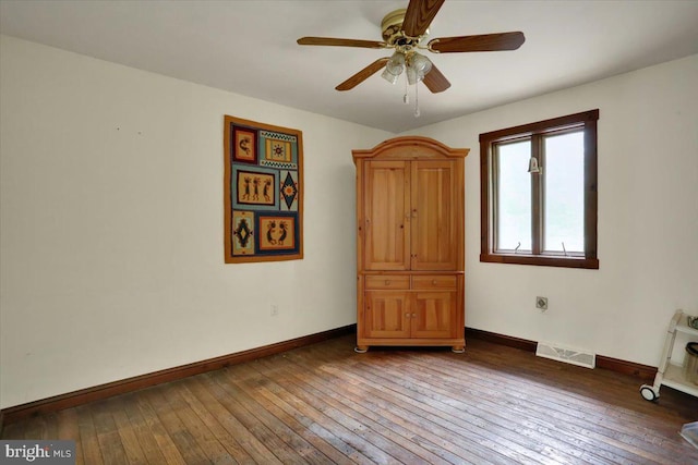 1184 Reservoir Rd, Honey Brook, PA 19344 - unfurnished bedroom with hardwood / wood-style flooring, baseboards, and a ceiling fan