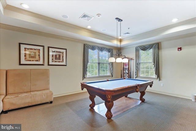 rec room featuring plenty of natural light, crown molding, a tray ceiling, and carpet floors