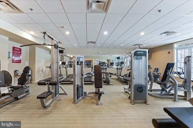 gym with a paneled ceiling, visible vents, recessed lighting, and carpet flooring