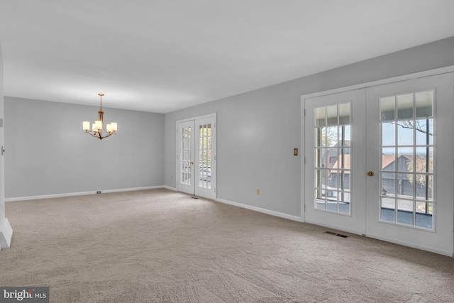 451 Lovell Ct, Hummelstown, PA 17036 - carpeted empty room featuring visible vents, a chandelier, french doors, and baseboards